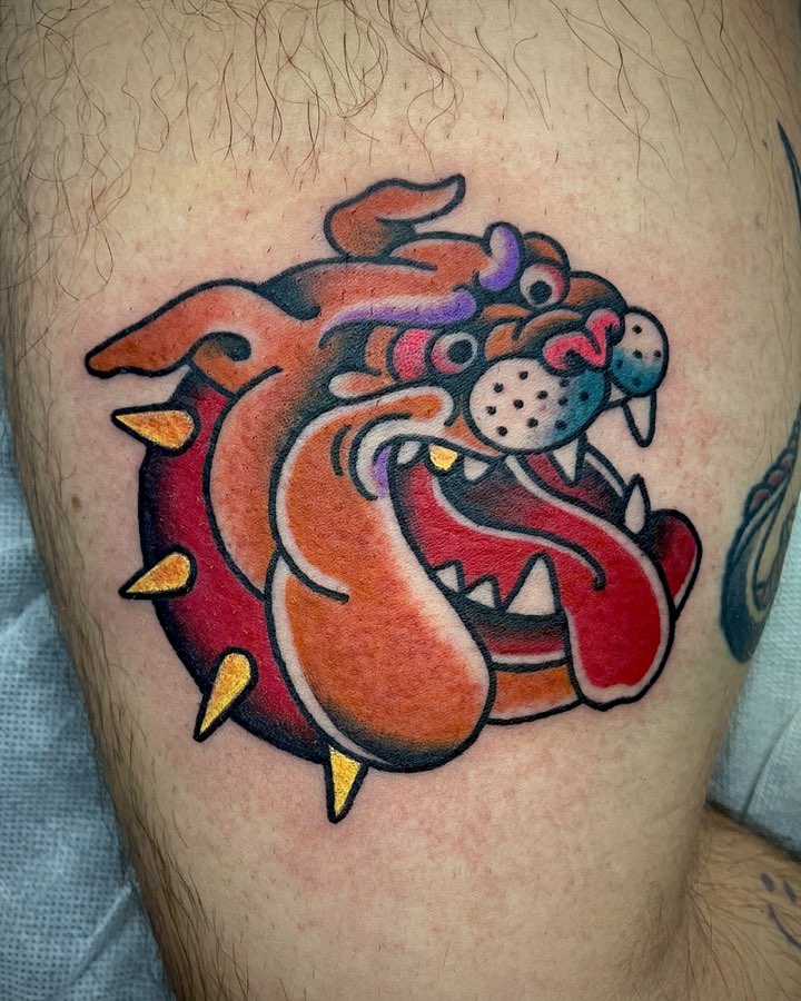 Traditional bulldog tattoo in bold color by Ink Donkey